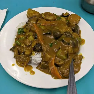 Diced Mushrooms with Curry over rice