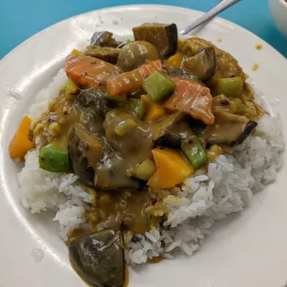 Diced Mushrooms with Curry Sauce Over Rice