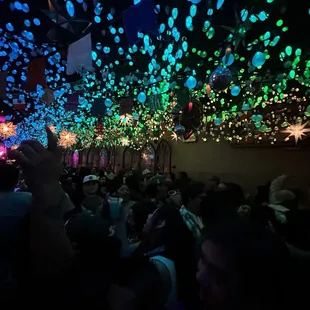 a crowd of people at a party