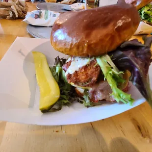 Poppin burger rare, covered in bacon and Jalapeno Poppers. Very good!