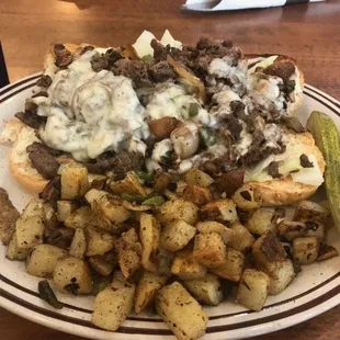 Philly cheesesteak sandwich (no tomato) With home fries