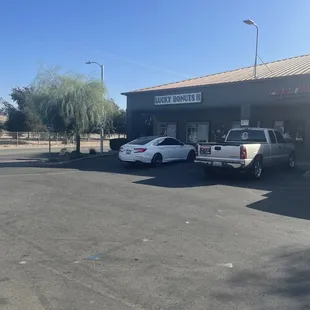 two cars parked in a parking lot