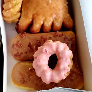 Strawberry French Clurl, Bacon Maple Bars, French Clurl, Apple Fritter and Bear Craw