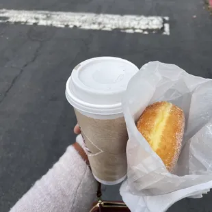A large coffee and donut