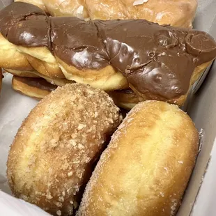 a variety of doughnuts in a box