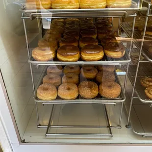 a display case full of doughnuts