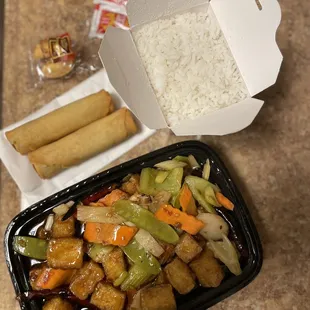 a meal in a takeout box