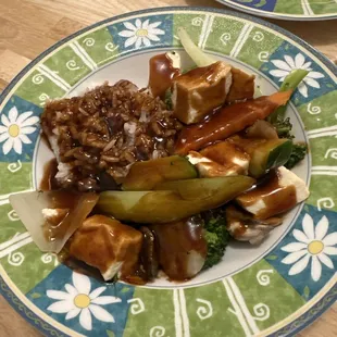 Steamed vegetables with tofu in garlic sauce