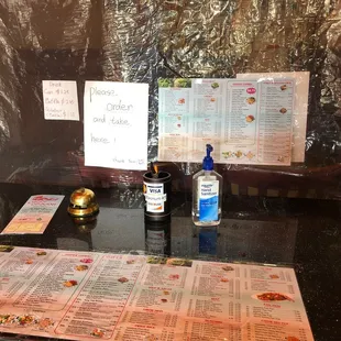 a table with menus and drinks