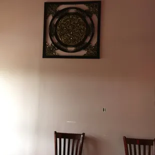 a pair of chairs in a room