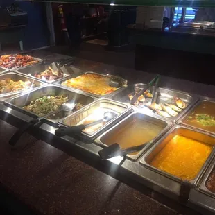 a buffet with many different types of food