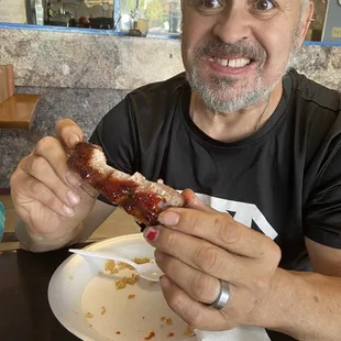 My dad enjoying the Bbq Spare Ribs