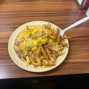 Chili cheese fries small order with chopped chiles on top