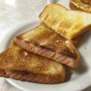 three pieces of toast on a plate