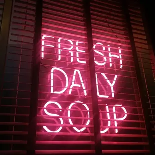 Neon sign, at sun down.