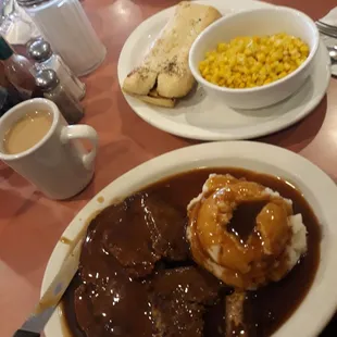 Huge plate size for 1 person not bad for the price 12.99 it was absolutely delicious.. lots of gravy n a side of garlic bread. $2.00..