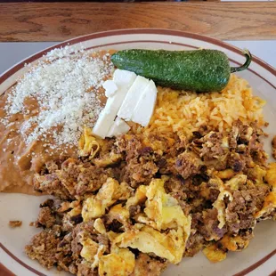 Chorizo plate with a big chili.