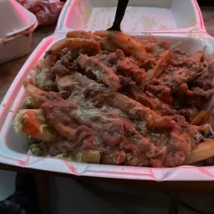 CARNE ASADA FRIES... NOT WITH CHEDDAR CHEESE THEY PUT DISGUSTING GOAT CHEESE
