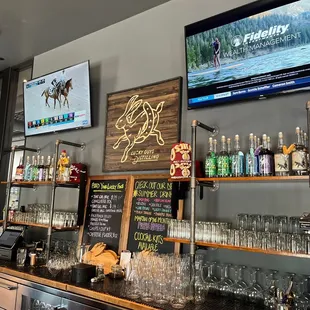a bar with a television above it