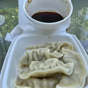 Not the same looking Steamed Dumps as shown in their reviews. Likely homemade as they claim, chicken-based, somewhat overcooked/soggy.
