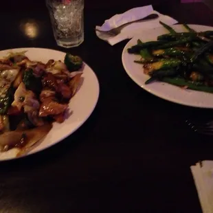 Happy family and a mix of green beans and asparagus