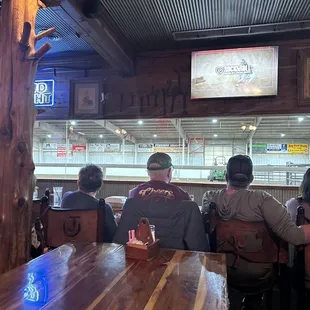 Watching barrel racing while eating