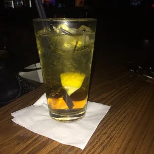 Sweet tea vodka and soda water with lemon.