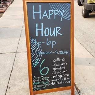 a happy hour sign