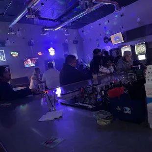 people sitting at the bar