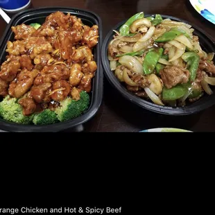 two trays of food on a table