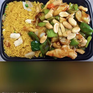 a meal of chicken, rice, and vegetables