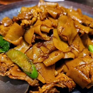 a plate of stir fried food