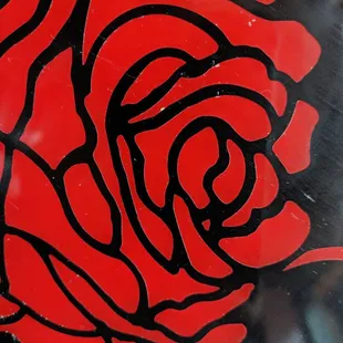 a red rose on a black background