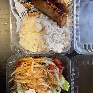 Lao sausage with steamed rice ( they don't have sticky rice )   Lao style papaya Salad