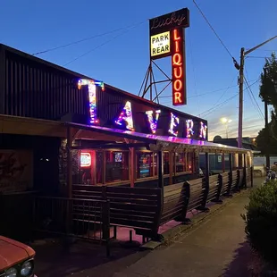 the neon sign for the restaurant