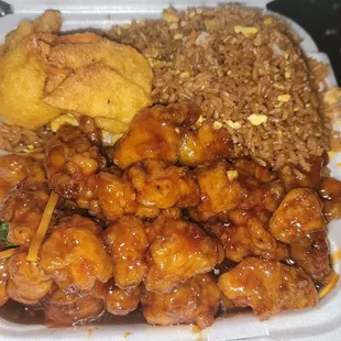 Orange chicken combo with fried rice and crab rangoon
