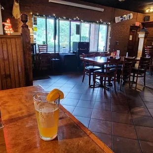 a drink in a glass on a table