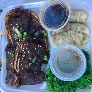 Buddha belly combo w/ short ribs: $12 Comes w/ rice, 3 dumplings(chicken or pork, steamed or fried), egg roll(not pictured), seaweed salad.