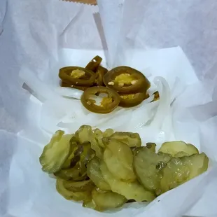 a hot dog and pickles