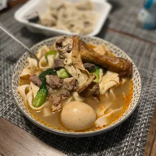 Flat noodles with chicken and lamb
