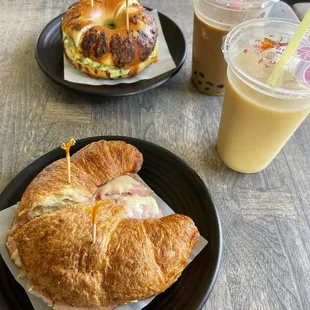 a croissant sandwich and iced coffee
