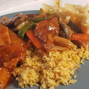 Szechuan chicken with crab rangoons and fried rice.