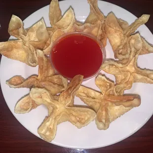 Crab puffs with sweet and sour sauce. So good and crunchy.