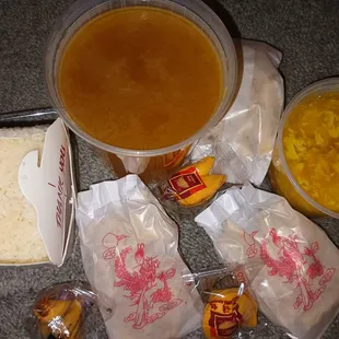 Small white rice, large clear soup, small egg drop soup. Come with crunchies