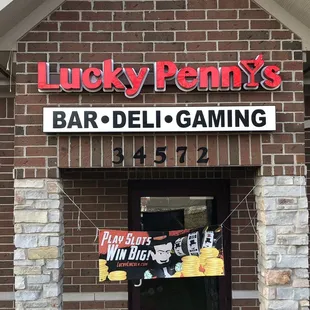 the front entrance of lucky penny's bar deli gaming