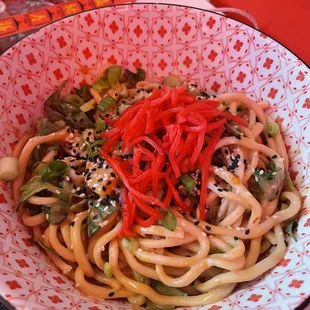 a bowl of noodles with vegetables
