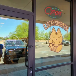 Exterior of the shop with hours