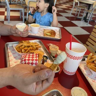 a child eating a hot dog
