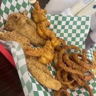 Fried fish and shrimp basket with onion rings