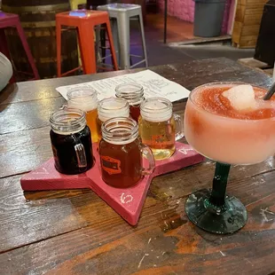 Beer flight and a strawberry piña colada!